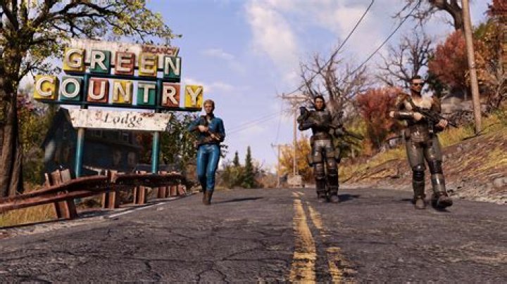 Fallout 76: three people in Brotherhood of Steel armor standing in a field.